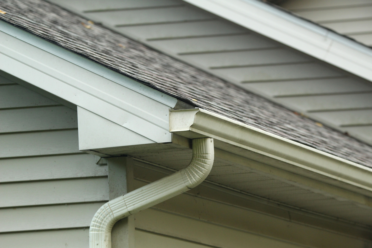 Close-up of house rooftop with rain gutter drainage system