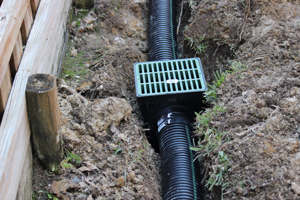 Underground drainage system installation in yard
