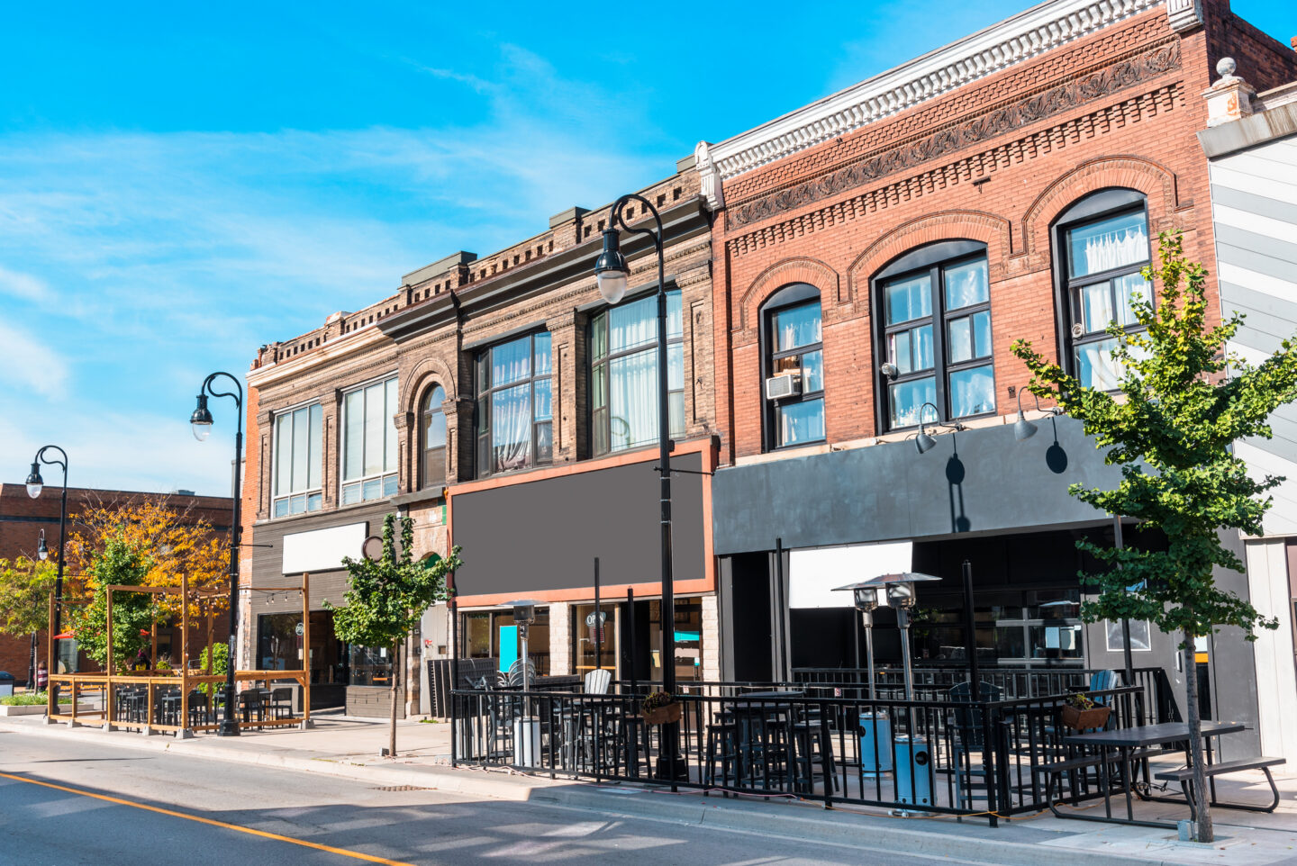 Scenic view of historic brick buildings with outdoor seating